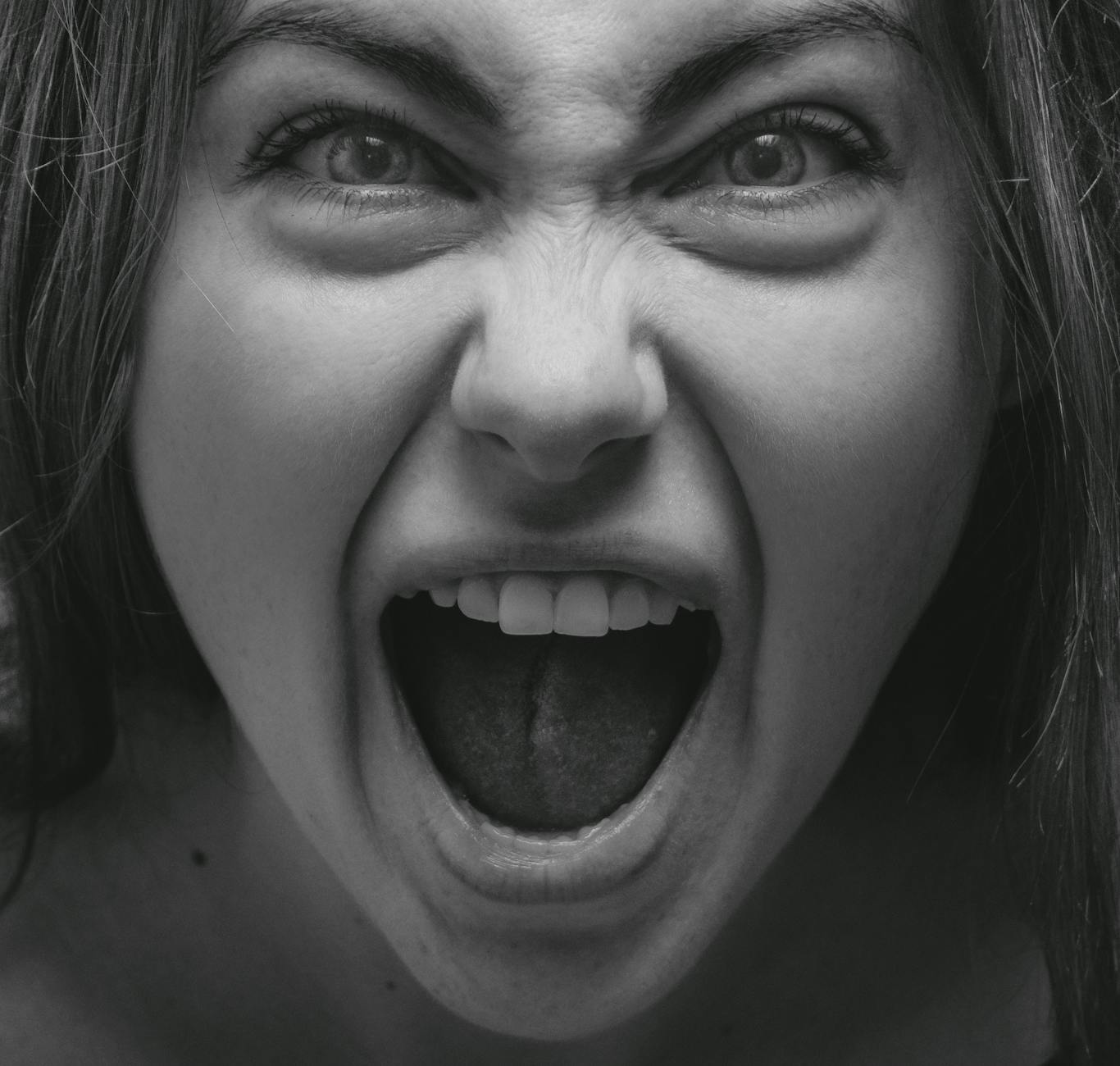 an angry woman screaming
