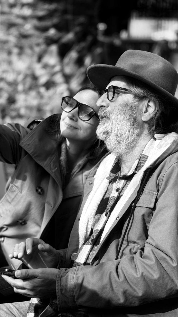 black and white urban couple selfie moment